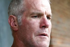 FILE - In this Oct. 17, 2018, file photo, former NFL quarterback Brett Favre speaks with reporters in Jackson, Miss., about his support for Willowood Developmental Center, a facility that provides training and assistance for special needs students, The Mississippi state auditor said Wednesday, May 6, 2020, that Favre is repaying $1.1 million he received for multiple speaking engagements where auditor’s staffers said Favre did not show up. An audit of the Mississippi Department of Human Services, released May 4, said a nonprofit group used welfare money to pay Favre for $500,000 in December 2017 and $600,000 in June 2018. Favre is not charged with any wrongdoing. (AP Photo/Rogelio V. Solis, File)