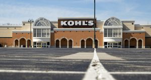 An empty parking outside a closed Kohl's store is shown in Indianapolis, Thursday, April 2, 2020. More than 6.6 million Americans applied for unemployment benefits the week of March 23, far exceeding a record high set just last week, a sign that layoffs are accelerating in the midst of the coronavirus. (AP Photo/Michael Conroy)