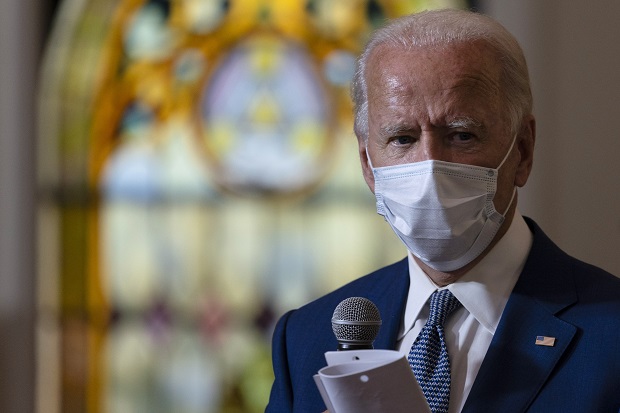 The Democratic presidential candidate former Vice President Joe Biden meets with members of the community at Grace Lutheran Church in Kenosha on Thursday. (AP Photo/Carolyn Kaster)