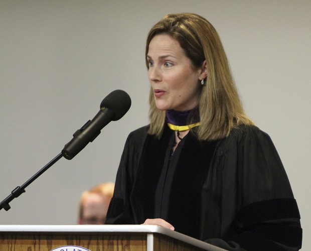 Amy Coney Barrett, then a University of Notre Dame law professor, gives a commencement address on June 11 to Trinity at Greenlawn graduates at the Trinity People of Praise Center in South Bend, Indiana. (Barbara Allison/South Bend Tribune via AP)
