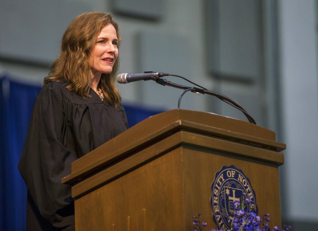 FILE - In this May 19, 2018, file photo, Amy Coney Barrett, United States Court of Appeals for the Seventh Circuit judge, speaks during the University of Notre Dame's Law School commencement ceremony at the university, in South Bend, Ind. Barrett, a front-runner to fill the Supreme Court seat vacated by the death of Justice Ruth Bader Ginsburg, has established herself as a reliable conservative on hot-button legal issues from abortion to gun control. (Robert Franklin/South Bend Tribune via AP, File)