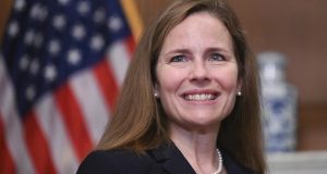 Judge Amy Coney Barrett, President Donald Trumps nominee for the U.S. Supreme Court, is shown while meeting with Sen. Mitt Romney, R-Utah, on Capitol Hill in Washington, Wednesday, Sept. 30, 2020. (Erin Scott/Pool via AP)