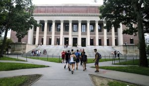 Students walk near the Widener Library at Harvard University on Aug. 13, 2019, in Cambridge, Massachusetts. A federal appeals court on Nov. 12 has upheld a district court decision clearing Harvard University of intentional discrimination against Asian American applicants. (AP Photo/Charles Krupa, File)