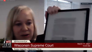 Jean Bousquet, CCAP's chief information officer, demonstrates how judges can use e-readers for annotating.