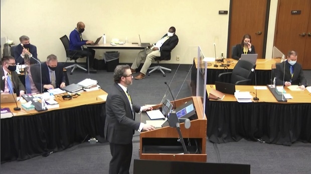 In this image taken from video, the defense attorney Eric Nelson questions Los Angeles police department Sergeant Jody Stiger, as Hennepin County Judge Peter Cahill presides on Wednesday in the trial of the former Minneapolis police Officer Derek Chauvin at the Hennepin County Courthouse in Minneapolis. Chauvin is charged in the May 25, 2020 death of George Floyd. (Court TV via AP, Pool)
