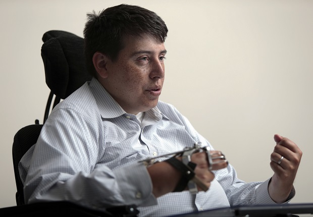 Rep. Jimmy Anderson, D-Fitchburg, responds on Aug. 12, 2016, to a question during an interview at the Wisconsin Journal in Madison. Anderson, a disabled Democratic lawmaker in Wisconsin, is asking Assembly Republicans to allow him to participate in floor sessions remotely, much as he was able to under accommodations sometimes used during the coronavirus pandemic. (M.P. King/Wisconsin State Journal via AP)