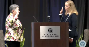 Wisconsin Supreme Court Chief Justice Annette Ziegler administers the oath to Cheryl Furstace Daniels, the new president of the State Bar of Wisconsin, on Wednesday.