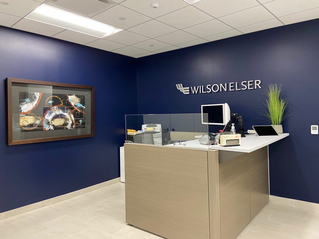 The new Wilson Elser Milwaukee office uses nautical navy blue as an accent color, an element inspired by Lake Michigan. Photo by Wilson Elser photo.