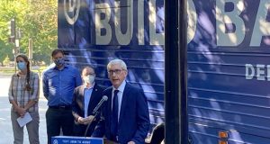 Democratic Gov. Tony Evers said that it was "outrageous" that Republicans planned to spend $680,000 on an investigation into the 2020 election in Wisconsin on Monday during a Democratic Party bus tour that stopped outside the state Capitol in Madison, Wisc. (AP Photo/Scott Bauer)