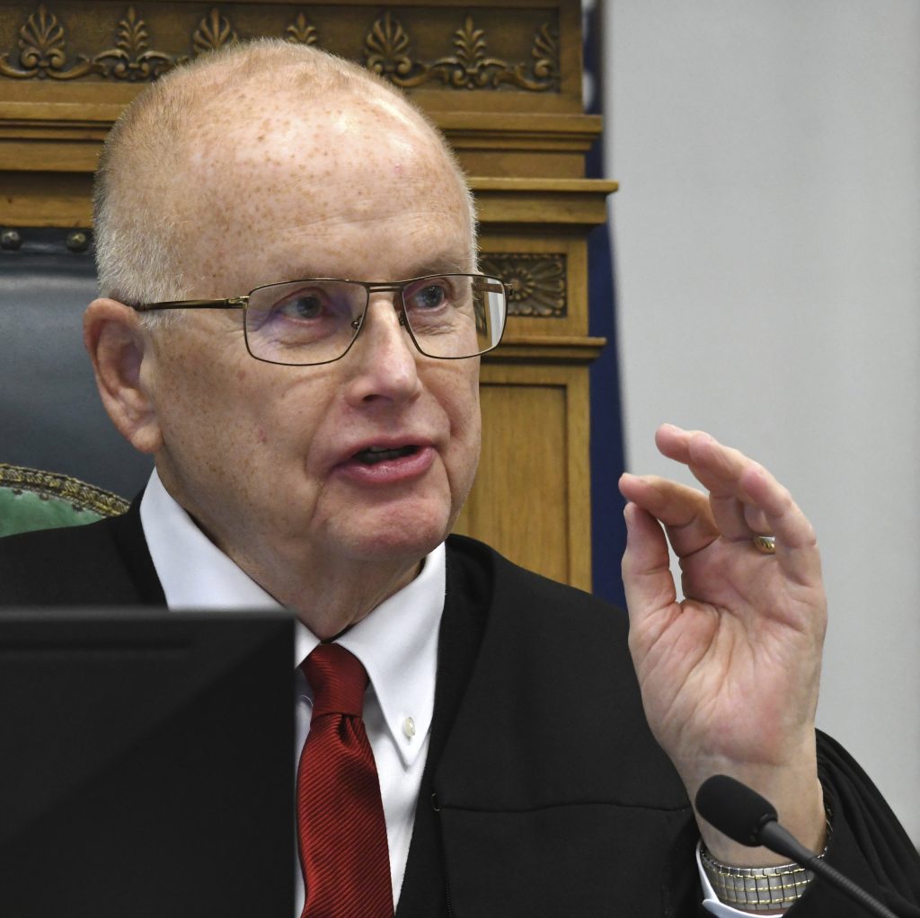 Judge Bruce Schroeder presides over a motion hearing, Tuesday, Oct. 5, 2021, in Kenosha, Wis., for Kyle Rittenhouse, who is accused of shooting three people during a protest against police brutality in Wisconsin last year. (Mark Hertzberg/Pool Photo via AP)