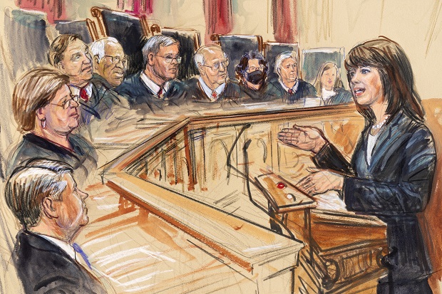 This artist sketch depicts Solicitor General Elizabeth Prelogar, right, presenting an argument before the U.S. Supreme Court, on Monday in Washington. Justices seated from left are Associate Justice Brett Kavanaugh, Associate Justice Elena Kagan, Associate Justice Samuel Alito, Associate Justice Clarence Thomas, Chief Justice John Roberts, Associate Justice Stephen Breyer, Associate Justice Sonia Sotomayor, Associated Justice Neil Gorsuch and Associate Justice Amy Coney Barrett. (Dana Verkouteren via AP)
