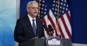 Attorney General Merrick Garland speaks during a Tribal Nations Summit during Native American Heritage Month, in the South Court Auditorium on the White House campus on Monday in Washington. The Justice Department is giving $139 million to police departments across the U.S. as part of a grant program that would bring on more than 1,000 new officers. (AP Photo/Evan Vucci, File)
