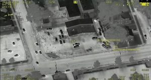 An image from FBI video, taken on Aug. 25, is shown during Kyle Rittenhouse's trial at the Kenosha County Courthouse in Kenosha on Wednesday. Prosecutors working to convict Rittenhouse in the shootings of three people during a protest against police brutality in Wisconsin have introduced as evidence surveillance video taken from an FBI airplane circling thousands of feet above the chaos. (FBI via AP)