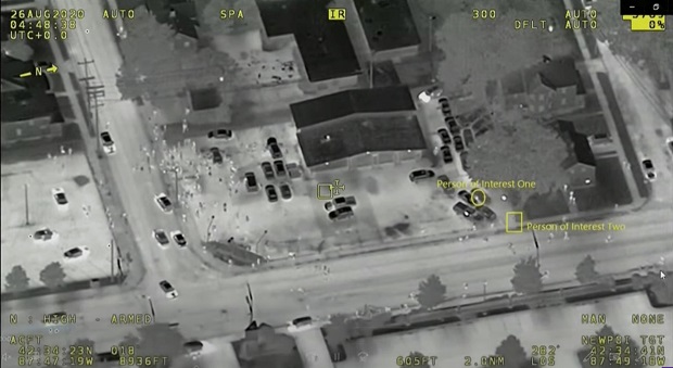 An image from FBI video, taken on Aug. 25, is shown during Kyle Rittenhouse's trial at the Kenosha County Courthouse in Kenosha on Wednesday. Prosecutors working to convict Rittenhouse in the shootings of three people during a protest against police brutality in Wisconsin have introduced as evidence surveillance video taken from an FBI airplane circling thousands of feet above the chaos. (FBI via AP)