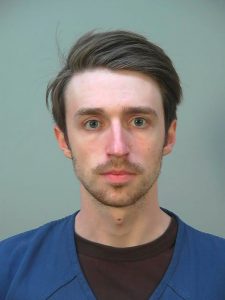 Chandler Halderson in a mugshot taken at the Dane County Sheriff's Office. Opening statements were scheduled for Tuesday in the trial of Chandler Halderson, a Wisconsin man charged with killing and dismembering his parents. (Dane County Sheriff's Office via AP)