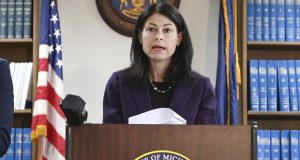 Attorney General Dana Nessel announces charges for several security guards from Northland Mall in the 2014 death of McKenzie Cochran during a news conference in Detroit on Oct. 14.  Nessel asked federal prosecutors, on Thursday to open a criminal investigation into 16 Republicans who submitted false certificates stating they were the state’s presidential electors despite Joe Biden’s 154,000-vote victory in 2020. (Max Ortiz/Detroit News via AP)