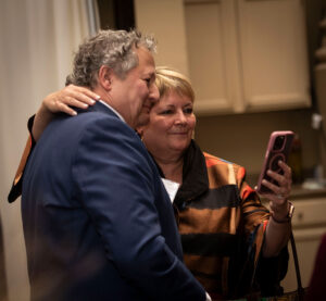 Attorney Mark Cameli (left) and Wisconsin Supreme Court Justice Janet Protasiewicz take a selfie.
