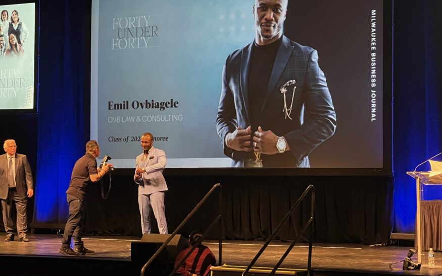 Emil Ovbiagele being honored with a 40 under 40 Award. Submitted photo from OVB Consulting.